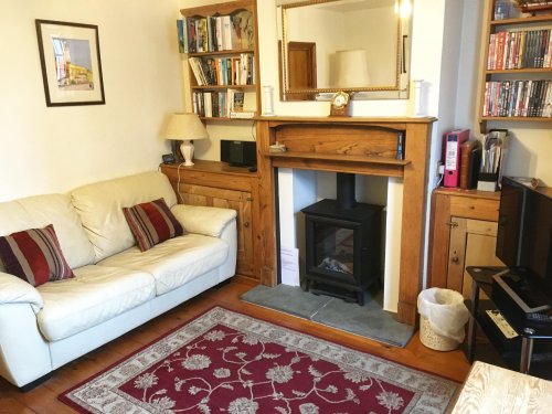 The Lounge at Lighthouse View Cottage, where the sea is just minutes from the front door.